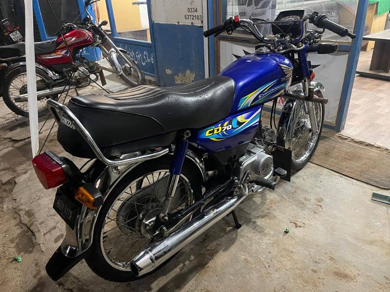 Honda CD 70 2024 8