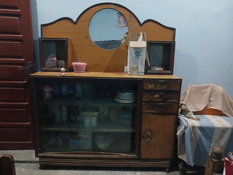 single bed, dressing table, showcase 0