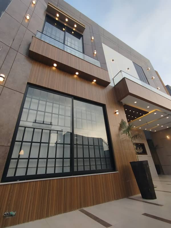 10 Marla Luxury Brand New Modern Style House Available For Sale In IRIS Block Sector C Bahria Town Lahore 1