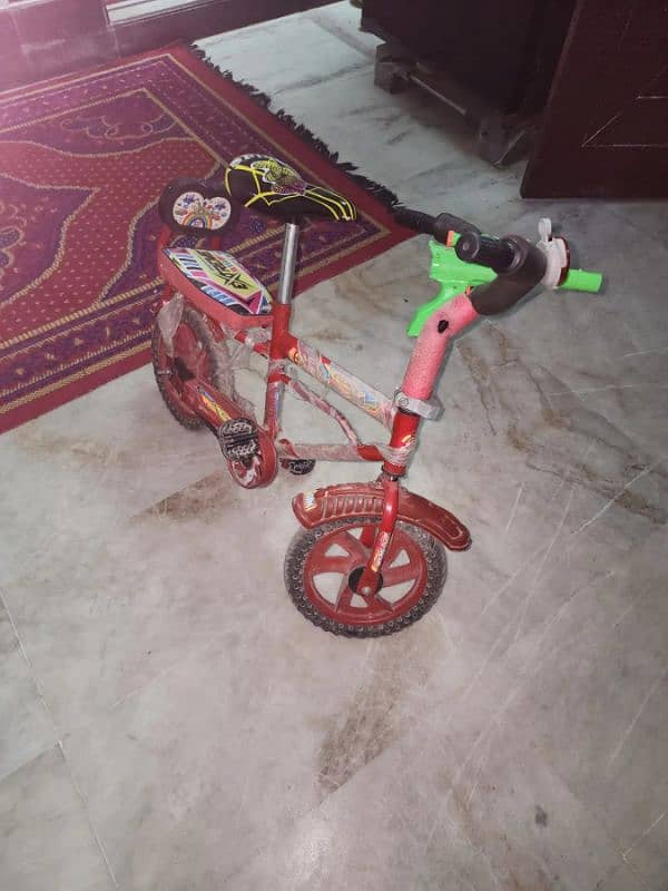 kids cycle urgent sale looking like new 4