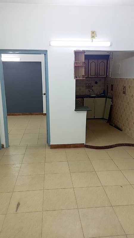 2 BEDS DRAWING DINING ROAD SIDE FLAT 13