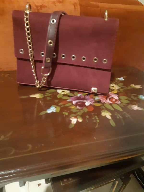 Maroon colour Shoulder bag for sale in good condition 0