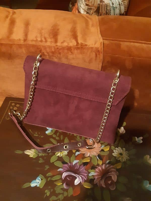 Maroon colour Shoulder bag for sale in good condition 1