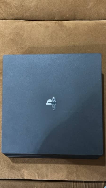 ps4 pro 1tb with 2 orignal controllers 2