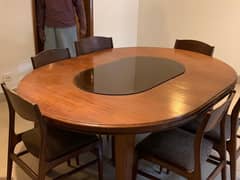 teak wood dining table (extendable)