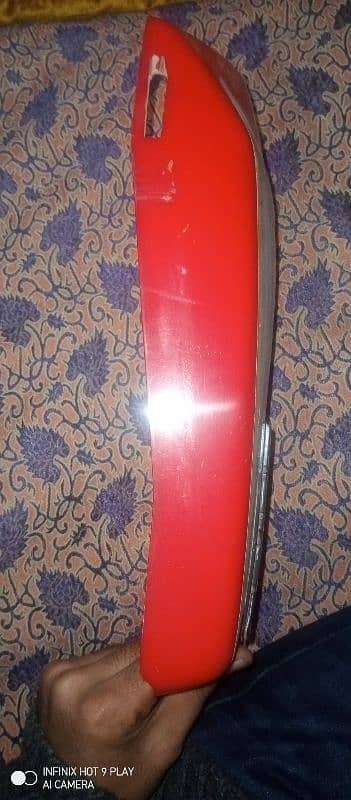 Honda 125 side cover 1 pic just color red 1