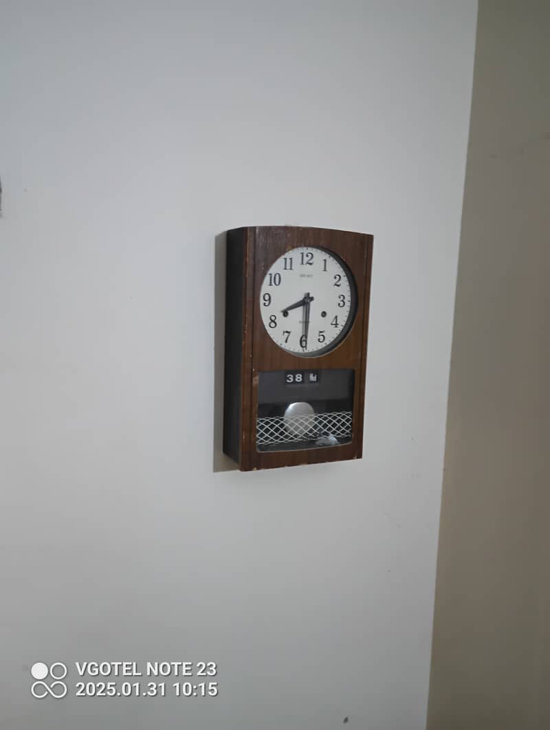 Antique wall clock 0