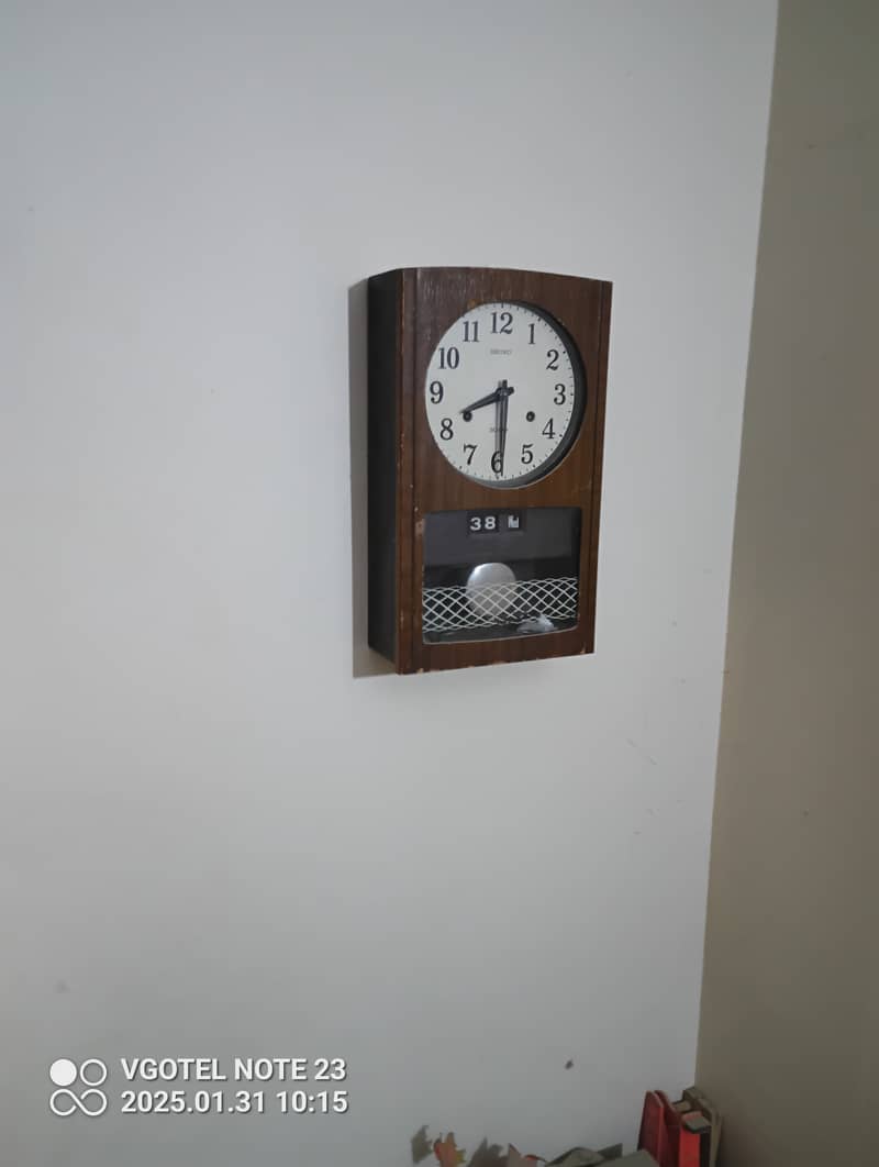 Antique wall clock 1