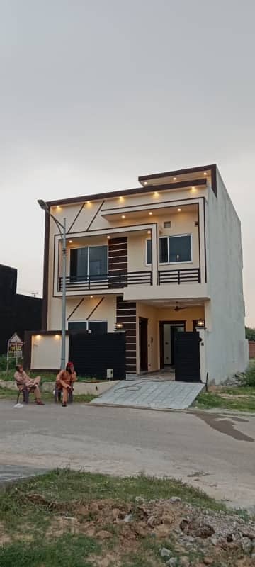 5 Marla Double Unit House Available. For Sale in Faisal Town F-18 Islamabad 7