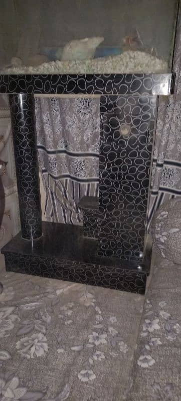 black Aqurium stand with head nd some accessories 2