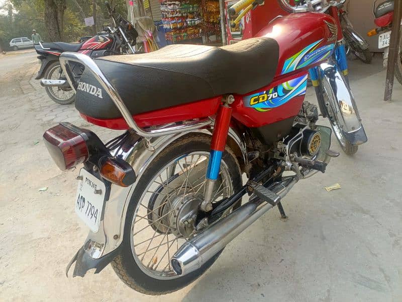 Honda CD 70 2024 4