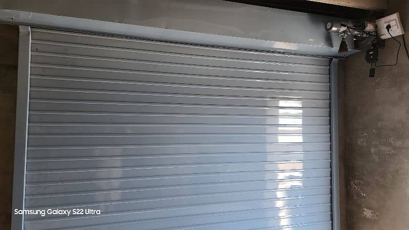 Automatic Shutters Aluminum & G. i shutters System 1