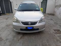 Suzuki Liana 2009for sale btr thn cultus alto city coure mehran wegonr