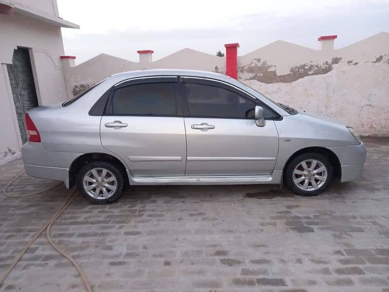 Suzuki Liana 2009for sale btr thn cultus alto city coure mehran wegonr 1