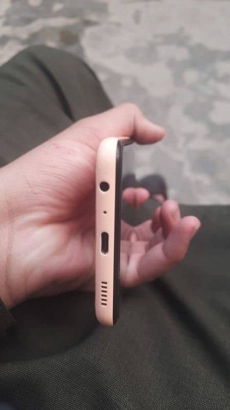 I am selling my Samsung Galaxy A13 peach colour 3