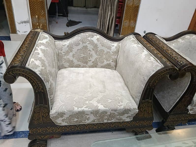 seven seater sofa set with sofa cover. with two wood and mirror table 2