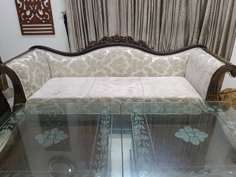 seven seater sofa set with sofa cover. with two wood and mirror table 5