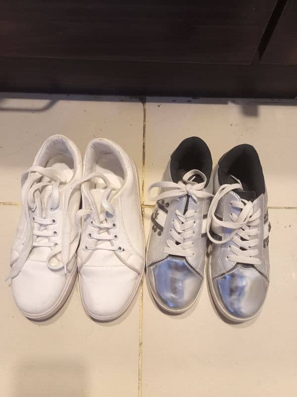 two pair of joggers shoes 2