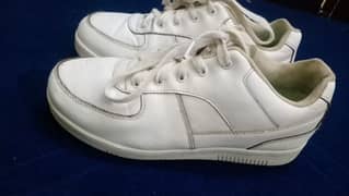 Single use premium quality "genuine grip " white shoes