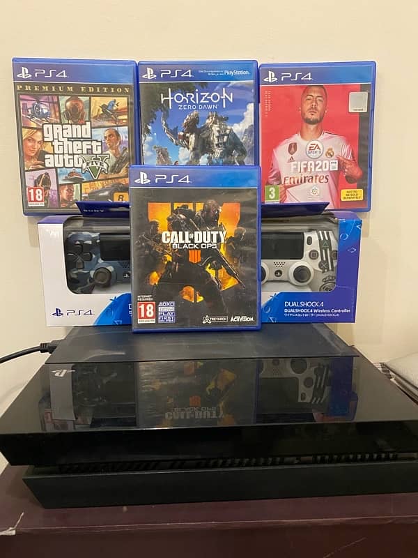 playstation 4 fat 500 gb with 4 games 0