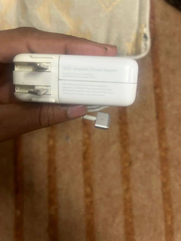 slightly used iphone Mac book pro original charger 0