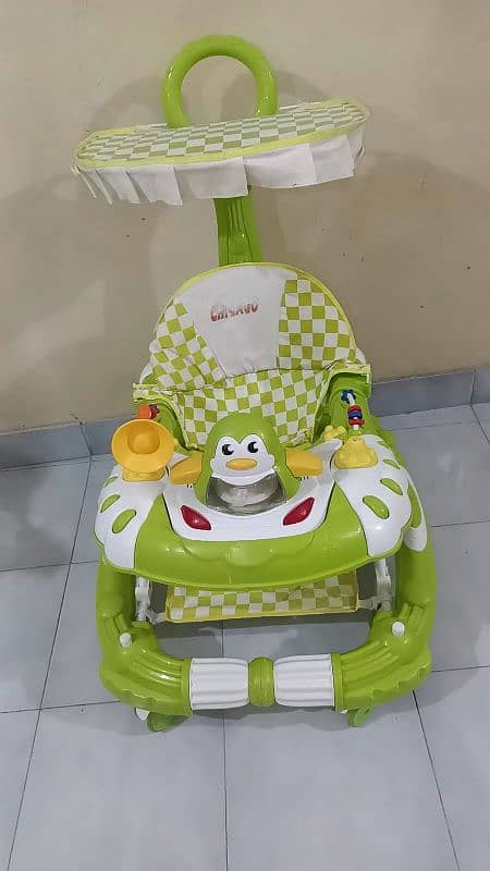 Baby Walker with sun roof For Sale Urgently Need money 1