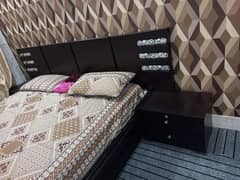 double bed with side table