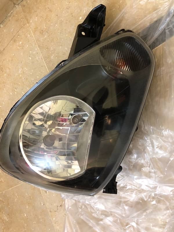 daihatsu mira es 2011 to 2017 headlight right side genuine 4