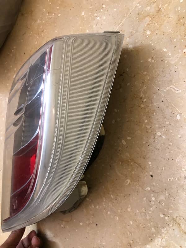 daihatsu mira es 2011 to 2014 model back light genuine 2