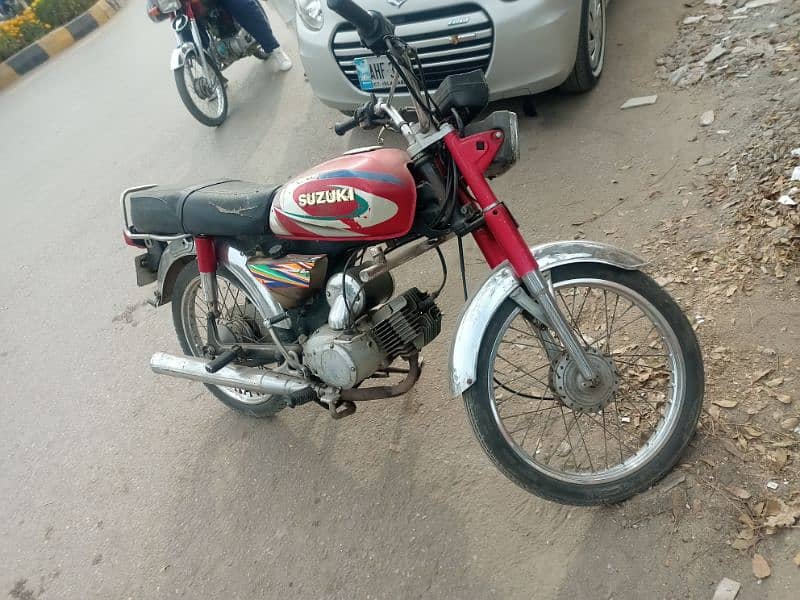 antique bike suzuki 100cc 2 Stoke Islamabad number 7