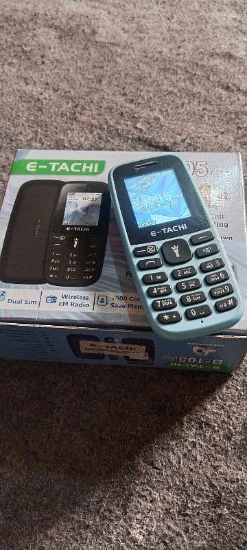 E. TACHI MOBAIL GOOD CONDITION 0