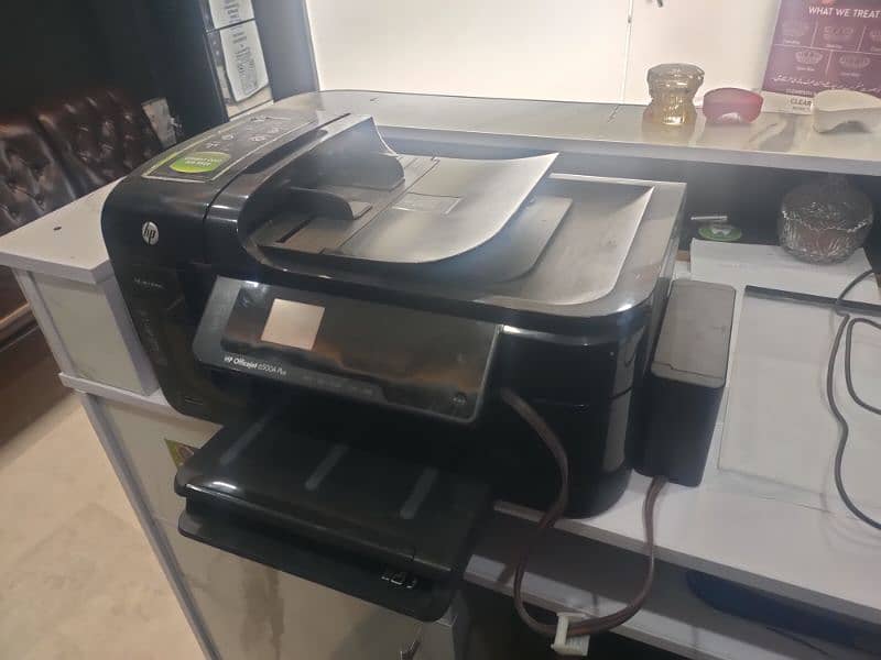 HP office jet 6500a plus e. with reset cartridge and external ink tank 0
