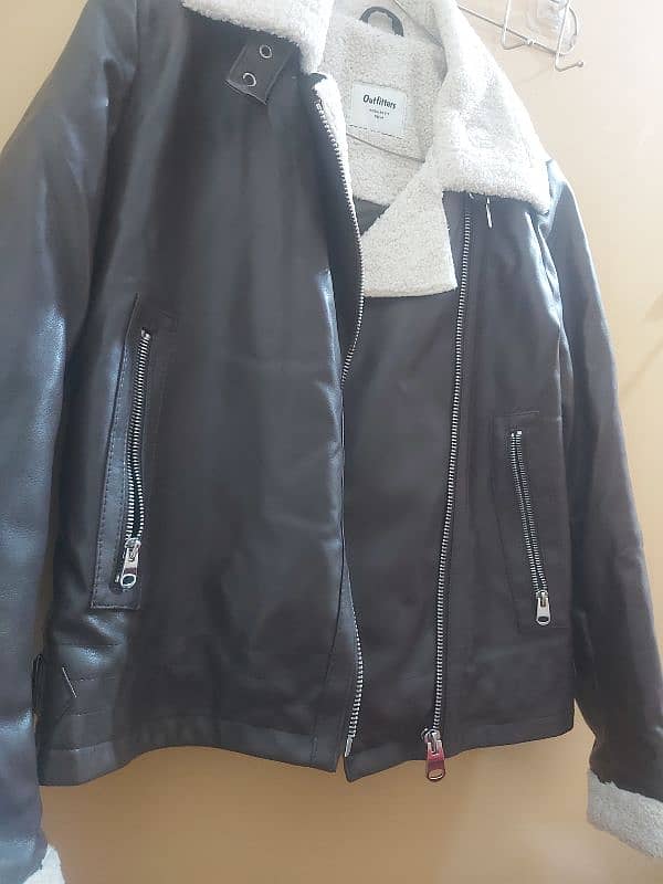 Branded leather jacket 1