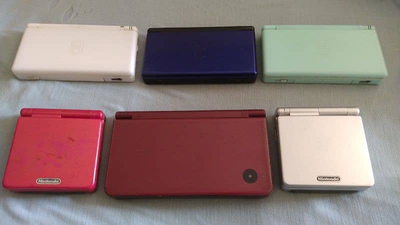 Gameboy sp 001 original- DSi XL-DS LiTE-NES-N64-PS2-XBOX Cds 0