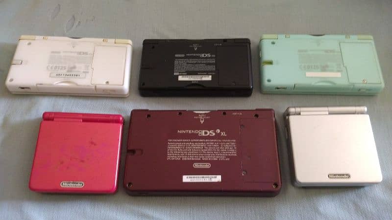 Gameboy sp 001 original- DSi XL-DS LiTE-NES-N64-PS2-XBOX Cds 1