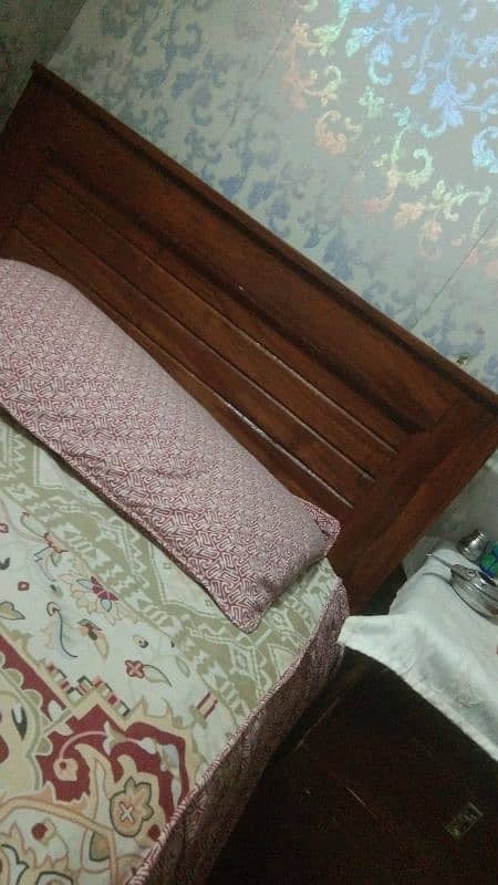 2 single wooden bed 3