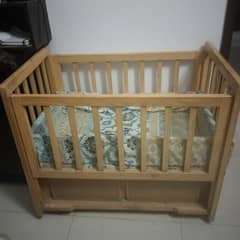 wooden baby cot