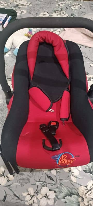 Carry cot/ car seat 1