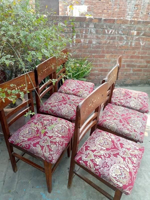 dinning wooden chairs with wooden center table 2