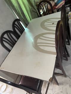 wooden table with 6 chairs