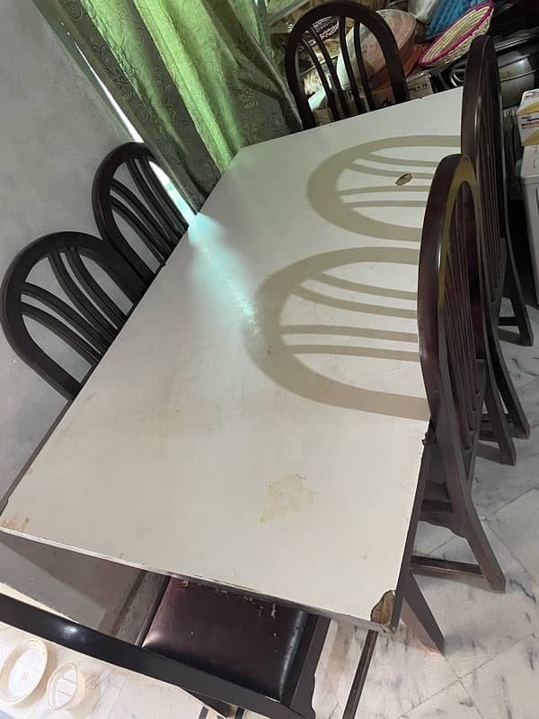 wooden table with 6 chairs 0