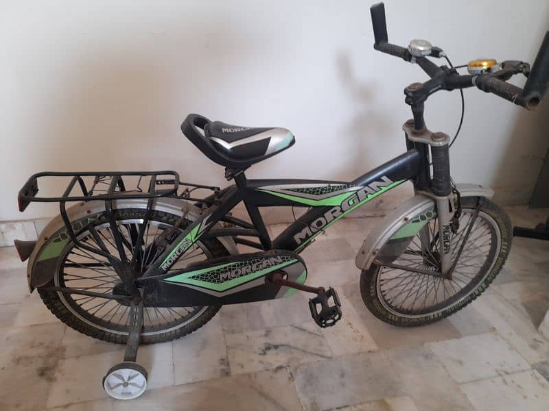 Green kids bicycle for 8 to 10 Yr old 0