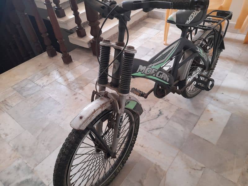 Green kids bicycle for 8 to 10 Yr old 2