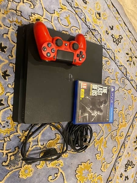 ps4 slim one 1tb with 2 games and 1 controller 0