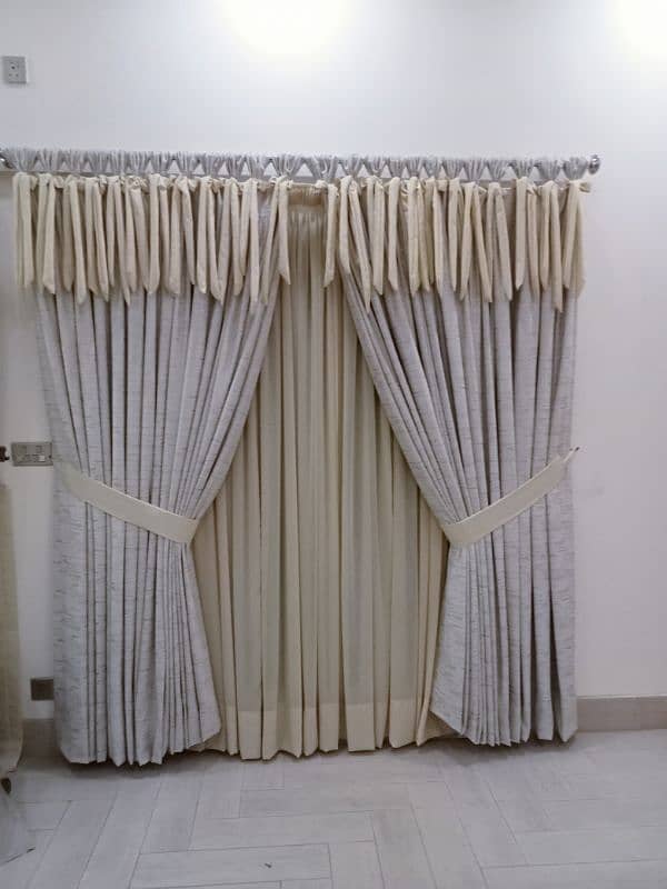 We have a curtain of sofa Poshish. Contact number 03469609848 5