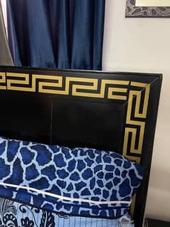 Bed with side tables for sale.