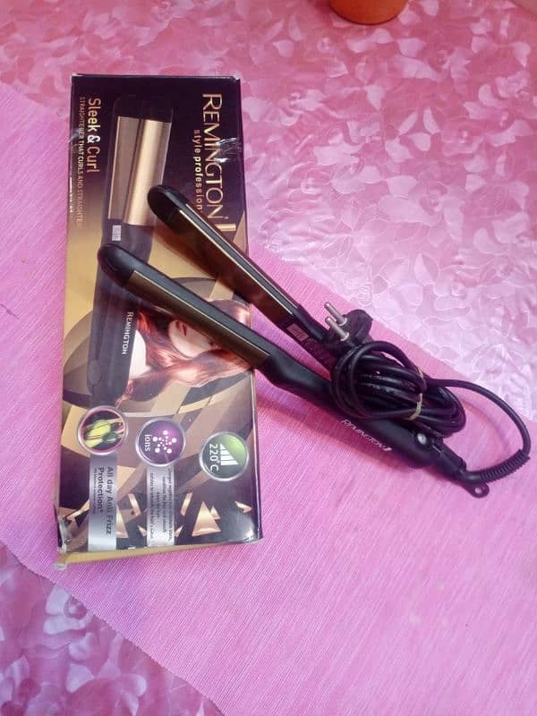 Remington straight and curl hair for sale only 2 time used 10/10 0