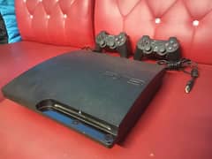 PS3 with 2 Controllers and 20+ Games (GTA included)