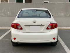 TOYOTA COROLLA 2010 XLi 1.3 VVTi MINT CONDITION WHITE LAHORE REG 2011