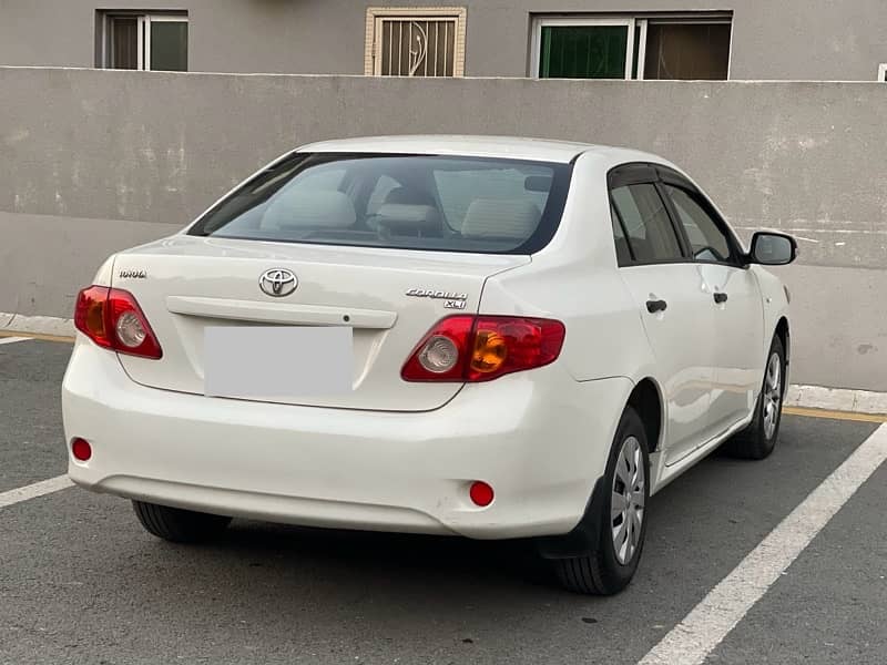 TOYOTA COROLLA 2010 XLi 1.3 VVTi MINT CONDITION WHITE LAHORE REG 2011 2